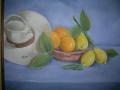 Oleo sobre lienzo "Bodegon con limones y sombrero